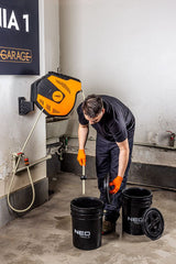 Bucket with separator and cap